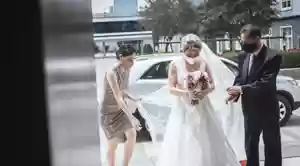 photograph of the bride entering the church
